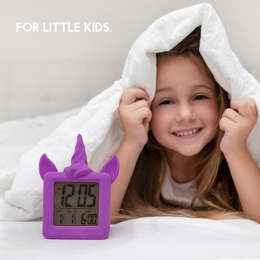 Something Unicorn - Unicorn Digital Alarm Clock with Snooze Button and Purple LCD Back-Lighting. Easy to Set Battery Powered Digital Clock in Silicone Sleeve with Time, Date and Alarm Display.(Purple)